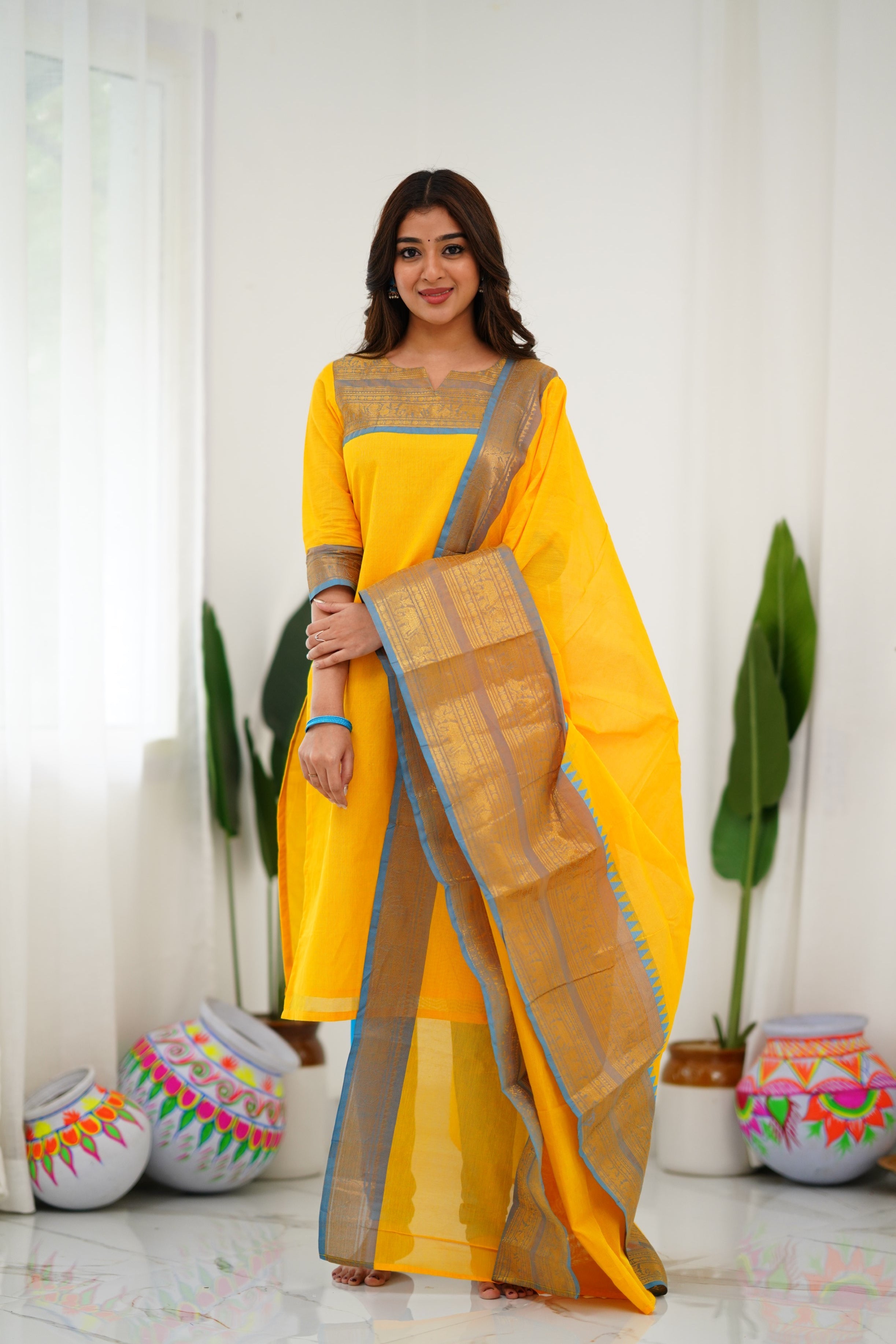 Bright Yellow Kanchi Cotton Kurti with Sky Blue Zari Dupatta
