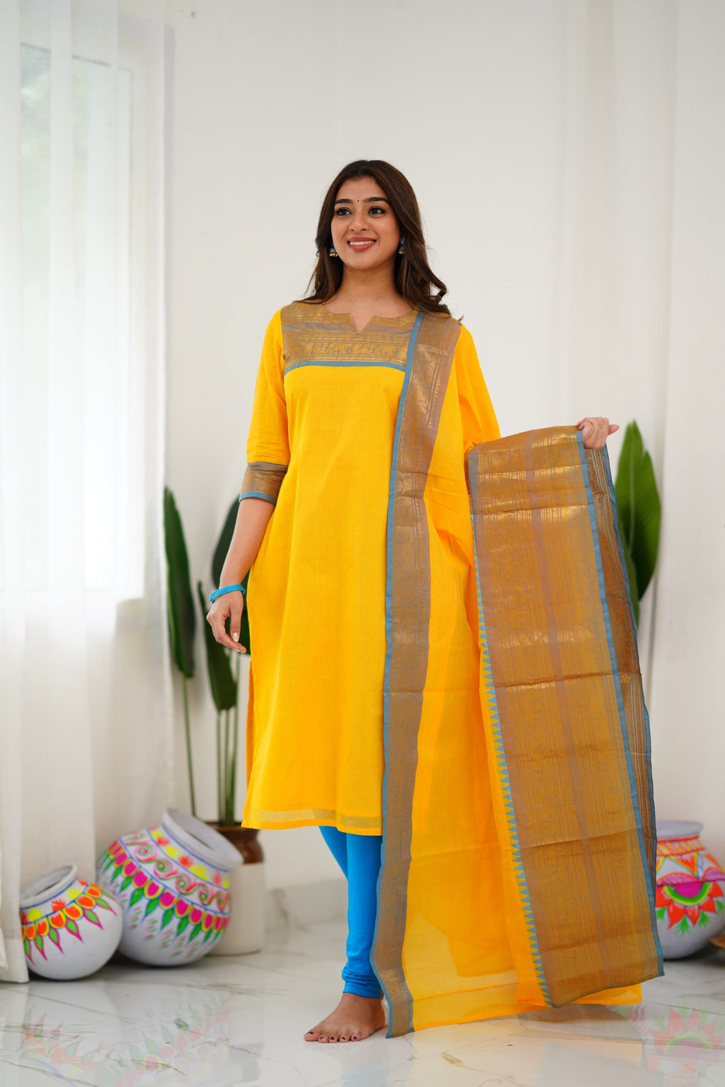 Bright Yellow Kanchi Cotton Kurti with Sky Blue Zari Dupatta