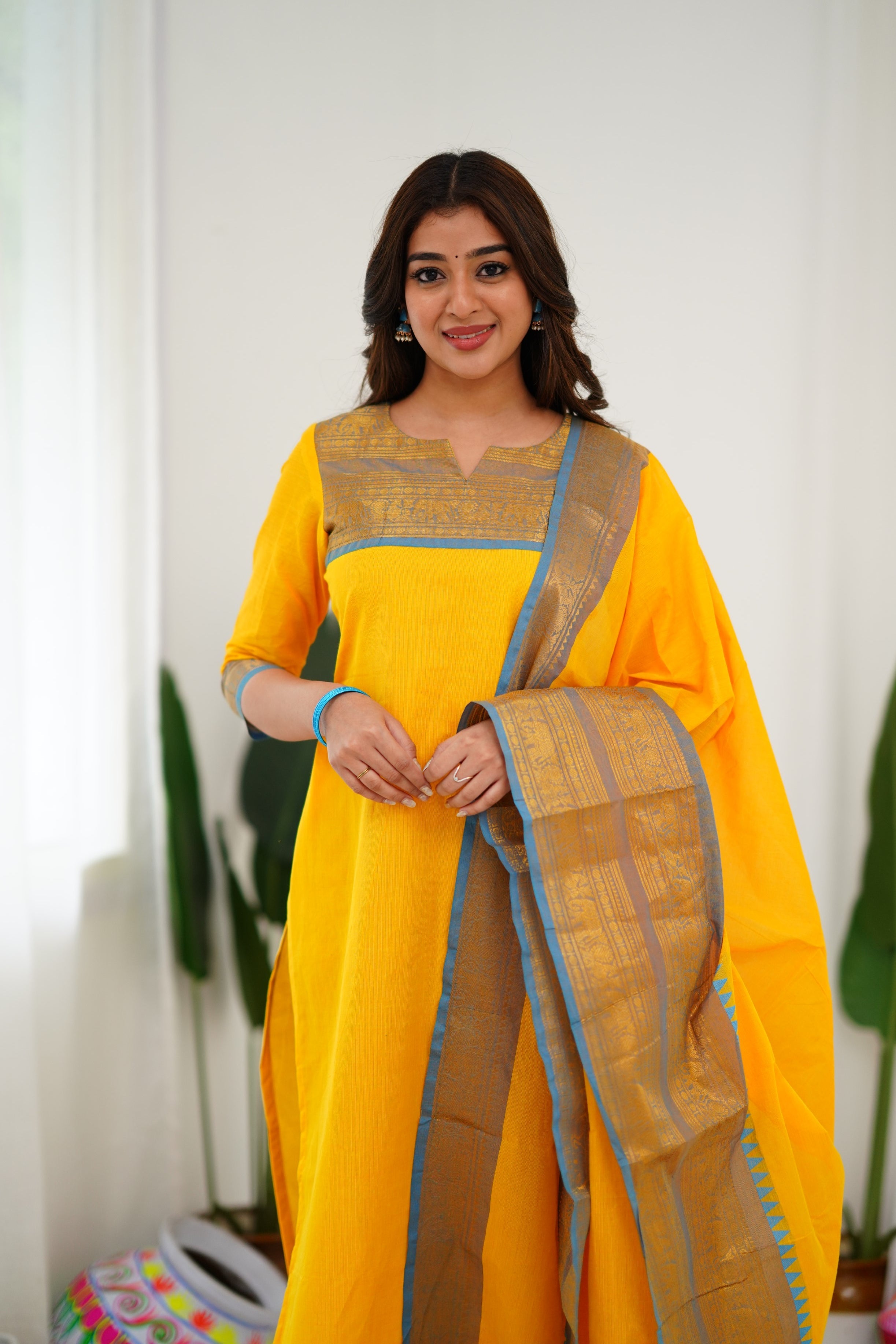 Bright Yellow Kanchi Cotton Kurti with Sky Blue Zari Dupatta
