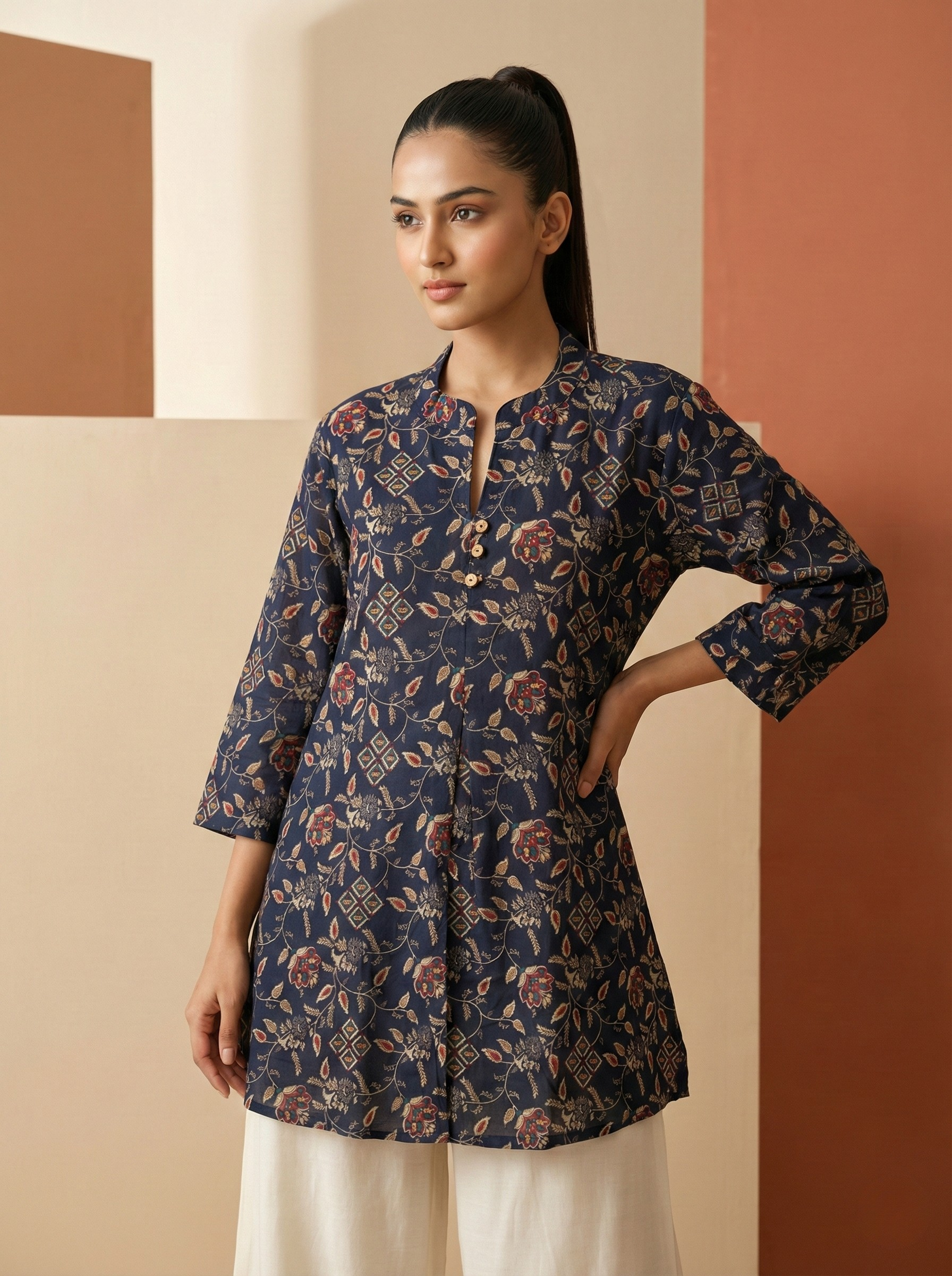 Kinjal Blue Floral Printed Poly Rayon Kurti Top | Stylish Casual & Office Wear Top